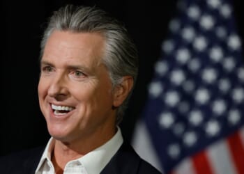 California Gov. Gavin Newsom speaks to reporters after he participated in a fireside chat at the California Economic Summit on Oct. 22, 2025, in Stockton, California.