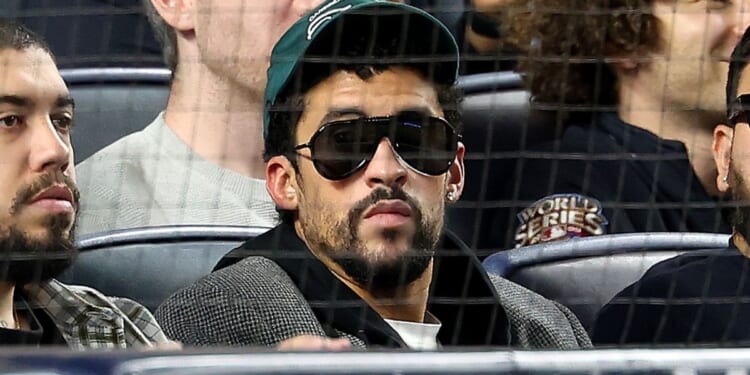 Bad Bunny attends the game between the New York Yankees and the Toronto Blue Jays in game three of the American League Division Series at Yankee Stadium in New York City on Tuesday.