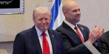 President Donald Trump arrives to address the Knesset, Israel’s parliament, with Amir Ohana, Speaker of the Israeli Knesset, on Oct. 13, 2025, in Jerusalem.
