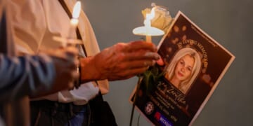 Attendees hold candles at a vigil for Iryna Zarutska in Charlotte, North Carolina, on Sept. 22, 2025.