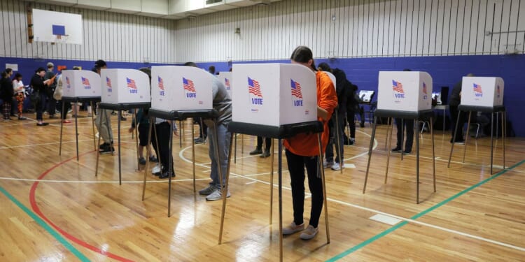 Voters cast their ballots at the Margaret Brent Elementary School in Baltimore, Maryland, on Nov. 5, 2024.