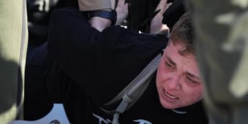 Protesters arrested, officers injured Friday in clash outside Chicago-area immigration facility