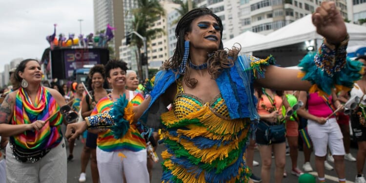 Brazilian revelers at Rio's Pride march rejoice after Bolsonaro's preemptive jailing