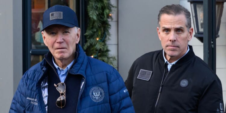President Joe Biden and son Hunter Biden stepping out of a bookstore while shopping in Nantucket, Massachusetts, on Nov. 29, 2024.