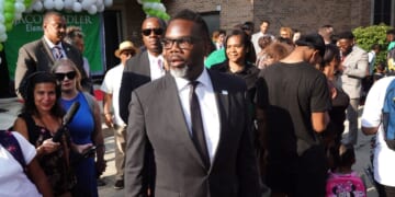 Chicago Mayor Brandon Johnson greets students, parents, and staff during the first day of classes at Beidler Elementary School on Aug. 21, 2023, in Chicago, Illinois.