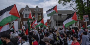 Hundreds of residents of Dearborn, Michigan, march through the neighborhoods in Dearborn on May 15, 2021, to protest the actions of the Israeli Army in Gaza as well as the forced removal of Palestinian families in Sheikh Jarrah in East Jerusalem.
