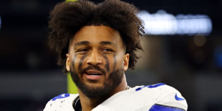 Dallas Cowboys defensive end Marshawn Kneeland walks off the field after a preseason NFL football game against the Baltimore Ravens in Arlington, Texas, on Aug. 16.