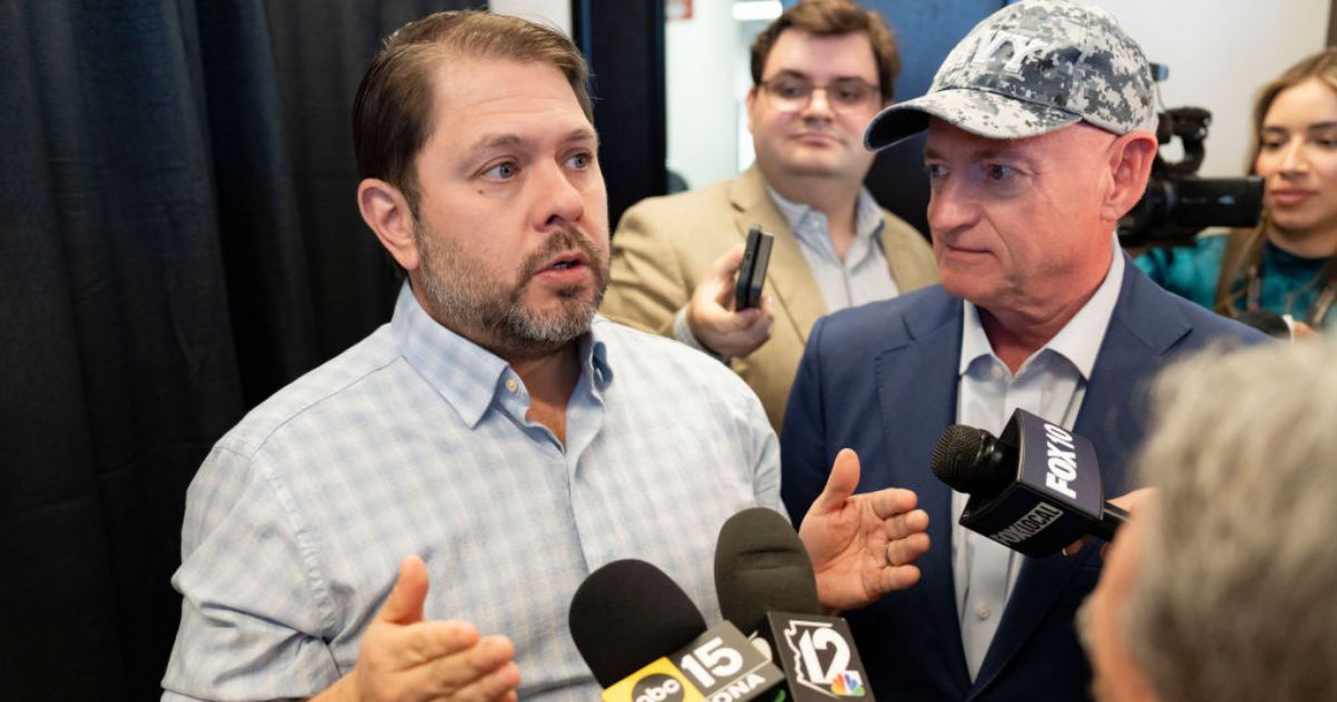 Sen. Ruben Gallego, left, an Arizona Democrat, appeared to threaten "consequences" for military service members who take part in a potential court-martial of his colleague, Democratic Sen. Mark Kelly of Arizona, right. The two are seen discussing Medicaid budget cuts at a March news conference in Scottsdale, Arizona.