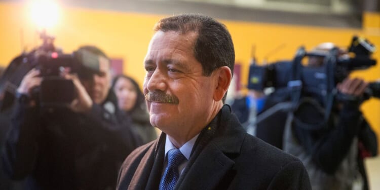 Rep. Jesus "Chuy" Garcia arrives at his polling place to vote on election day Feb. 24, 2015, in Chicago, Illinois.