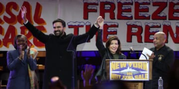 New York City Mayor-elect Zohran Mamdani holds hands with New York Gov. Kathy Hochul on stage during a campaign rally at Forest Hills Stadium in the Queens borough of New York City on Oct. 26, 2025.