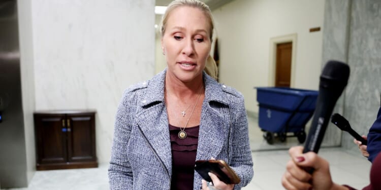 Marjorie Taylor Greene speaks to reporters outside her office in the Rayburn House Office Building in Washington, DC on Nov. 17, 2025.