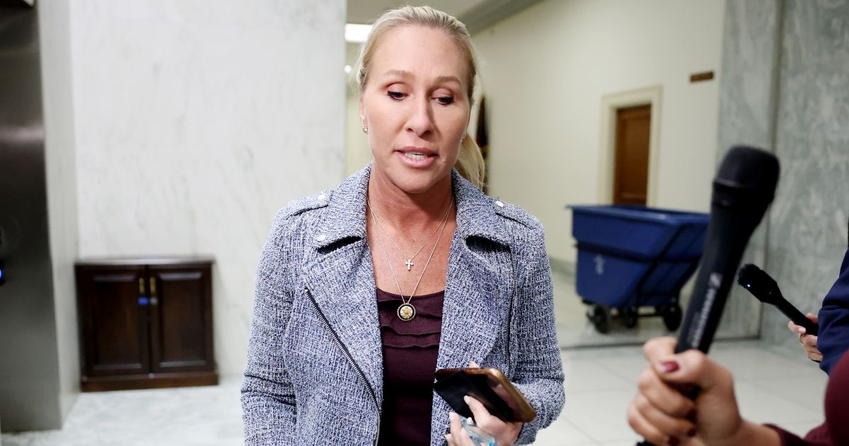 Marjorie Taylor Greene speaks to reporters outside her office in the Rayburn House Office Building in Washington, DC on Nov. 17, 2025.