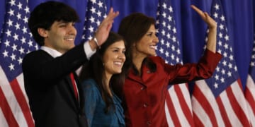 Then-presidential candidate Nikki Haley waves to supporters alongside her son, Nalin Haley, and her daughter, Rena Haley, in Charleston, South Carolina, on February 24, 2024.