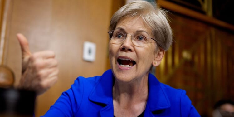 Sen. Elizabeth Warren speaks as Health and Human Services Secretary Robert Kennedy Jr. appears before a Senate Finance Committee hearing at the Dirksen Senate Office Building in Washington, D.C., on Sept. 4.