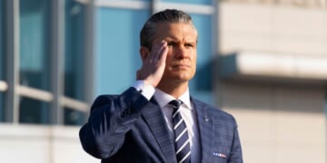 Secretary of Defense Pete Hegseth salutes as he inspects a guard of honor in Seoul, South Korea on Nov. 4, 2025.