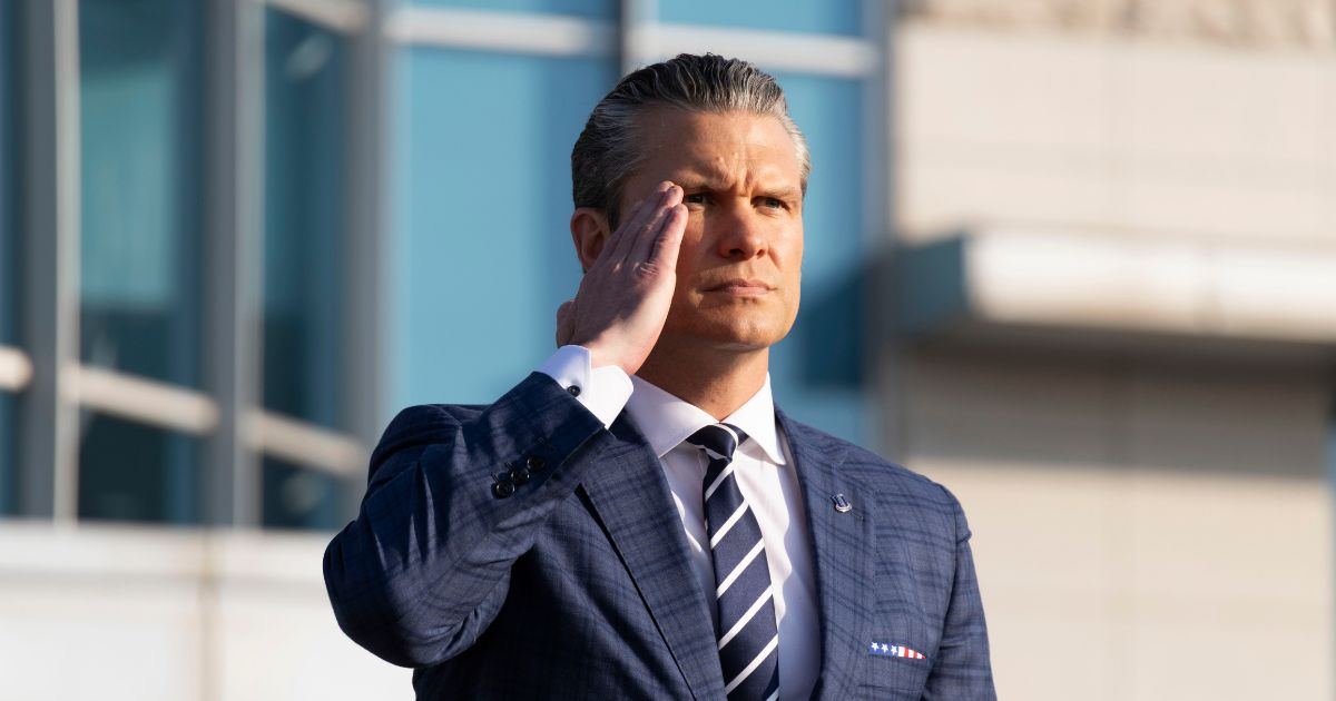 Secretary of Defense Pete Hegseth salutes as he inspects a guard of honor in Seoul, South Korea on Nov. 4, 2025.