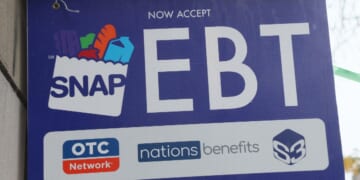 An EBT sign is displayed in the window of a grocery store in New York City on Oct. 30, 2025.