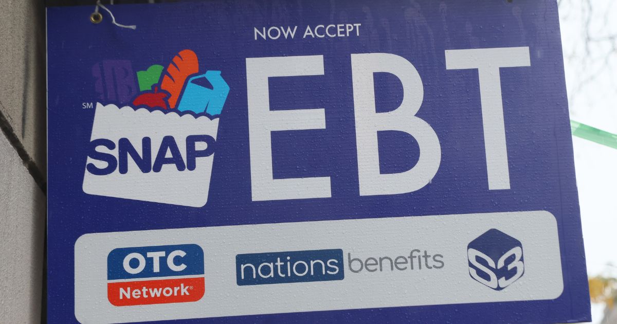 An EBT sign is displayed in the window of a grocery store in New York City on Oct. 30, 2025.