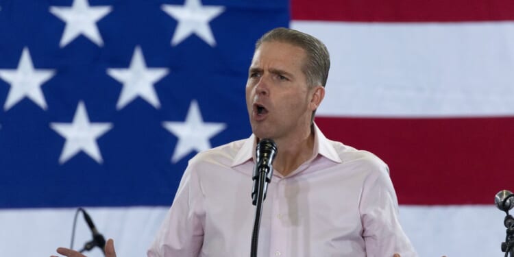 Conservative commentator Scott Jennings speaks at the Ashley's BBQ Bash fundraiser hosted by U.S. Rep. Ashley Hinson on August 23, 2025, in Cedar Rapids, Iowa.