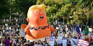 Protesters rally during the "No Kings" national day of protest in Los Angeles, California, on Oct. 18, 2025.