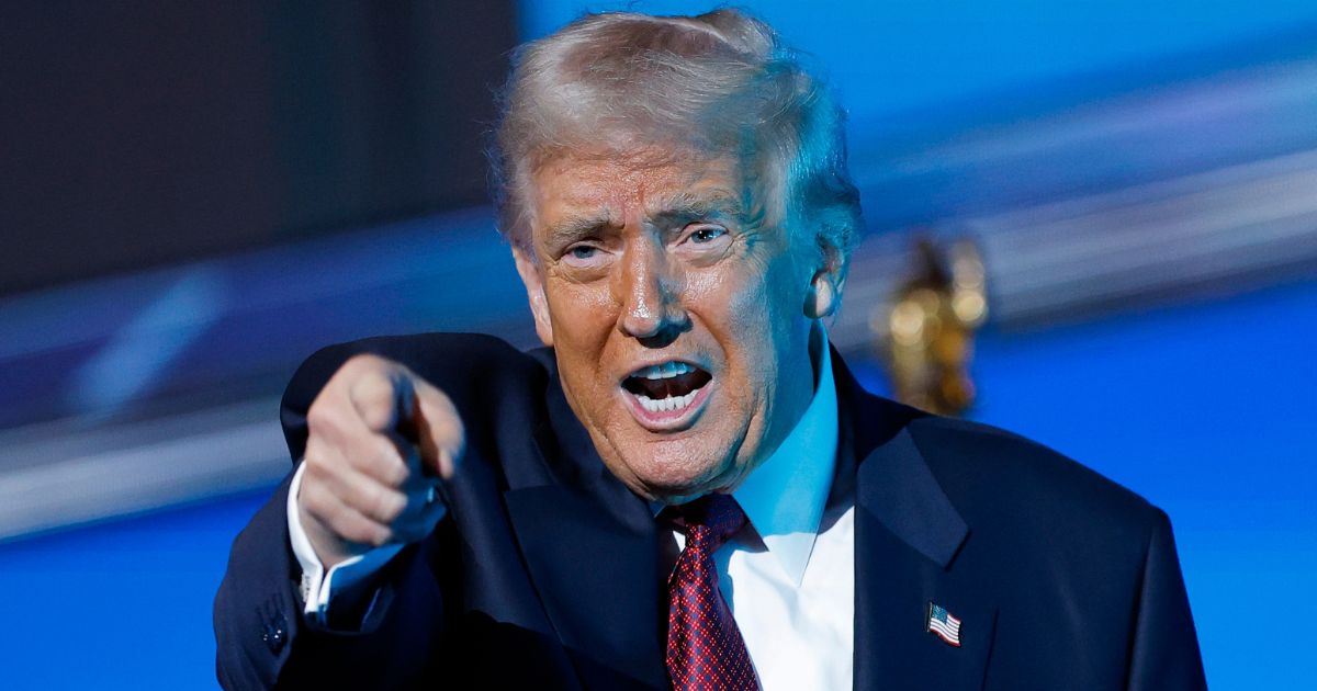 President Donald Trump gestures after delivering remarks during the America Business Forum in Miami, Florida, on Wednesday.