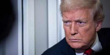 President Donald Trump speaks to reporters aboard Air Force One as it heads for Florida during his trip to Mar-a-Lago in Palm Beach, Florida, on Nov. 25, 2025.