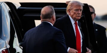 President Donald Trump steps out of the presidential limousine before boarding Air Force One en route to the White House on Nov. 2, 2025, at Palm Beach International Airport in West Palm Beach, Florida.