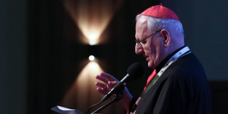 Cardinal Louis Raphael Sako, the Patriarch of the Chaldean Catholic Church, addresses addresses church members in Arbil, the capital of the autonomous Kurdish region of northern Iraq, on April 23, 2025.