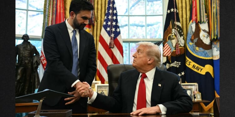 President Donald Trump shakes hands with New York Mayor-elect Zohran Mamdani Friday as they meet in the Oval Office of the White House in Washington, D.C.