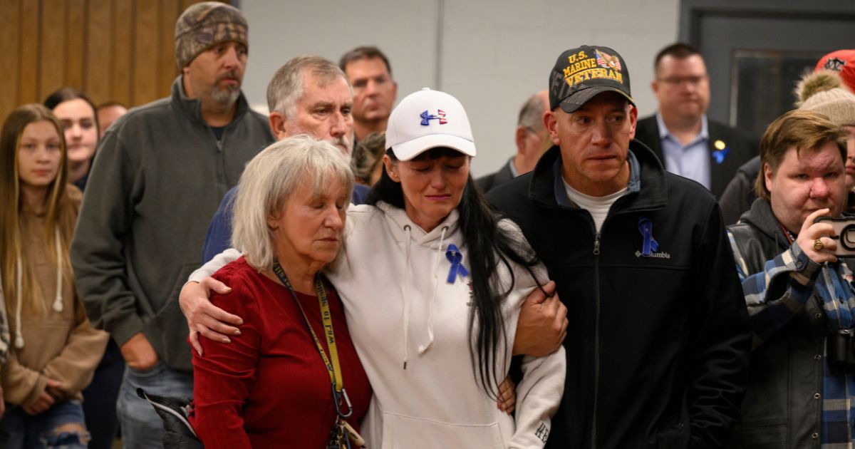 Community members gather at a vigil for West Virginia National Guard Specialist Sarah Beckstrom at the town hall on Nov. 28, 2025, in Webster Springs, West Virginia.