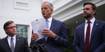 Senate Majority Leader John Thune holds a copy of a funding bill as he delivers remarks following a meeting with Congressional Democrats and President Donald Trump at the White House on Sept. 29, 2025, in Washington, D.C.