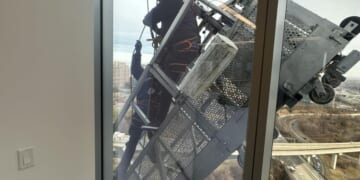 Window washers rescued from dangling basket 15 stories up at Tysons