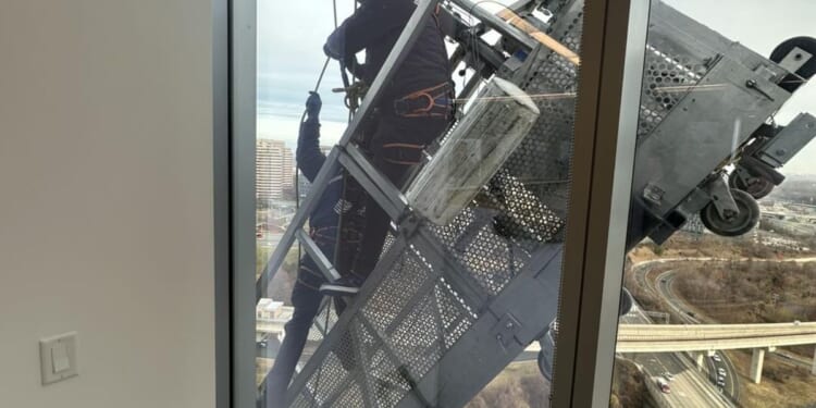 Window washers rescued from dangling basket 15 stories up at Tysons