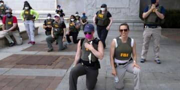 Former FBI agents, fired for kneeling during racial justice protest, sue for reinstatement