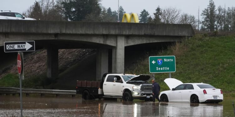 Tens of thousands in Washington state facing evacuations as rain continues to pound the region