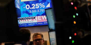 Dow hits record high as Trump tries to soothe Americans' economic frustration