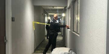 Person of interest in custody after shooting at Brown University kills two and wounds nine others