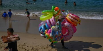 Trump's oil blockade threat creates anxiety in Venezuela, but people stick to their daily lives