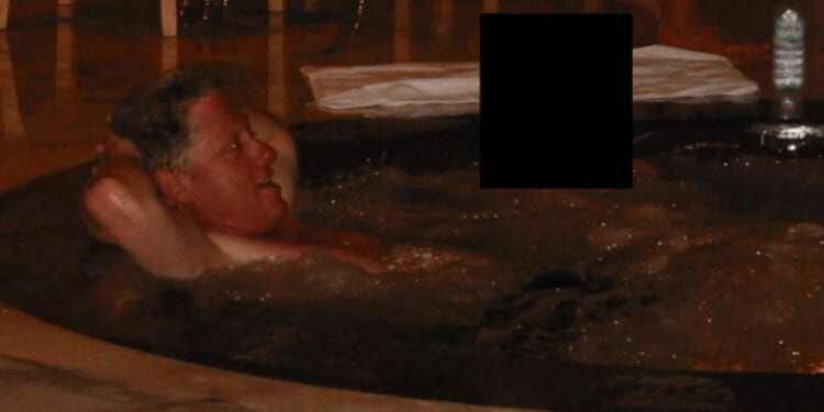 Former President Bill Clinton turns up in newly released 'Epstein files' -- in a hot tub