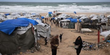 Rain floods Gaza camps as Benjamin Netanyahu heads for U.S. meeting