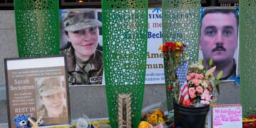 A makeshift memorial stands outside the Farragut West Metro station on Dec. 1, 2025, in Washington, D.C.