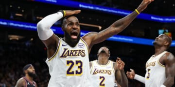 Lebron James of the Los Angeles Lakers looks for a foul call during the first half of a game against the Phoenix Suns at Mortgage Matchup Center on Dec. 14, 2025, in Phoenix, Arizona.