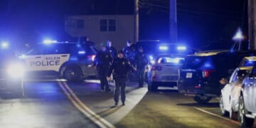 Law enforcement officers secure an area near where the Brown University shooter was reportedly seen in Salem, New Hampshire, on Dec. 18, 2025.