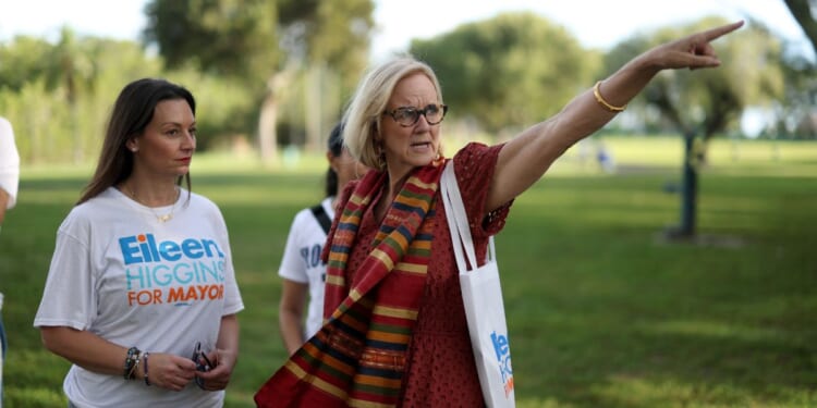 City of Miami mayoral candidate Eileen Higgins and Florida Democratic Party Chair Nikki Fried prepare to canvass a neighborhood for votes on Dec. 8, 2025, in Miami, Florida.