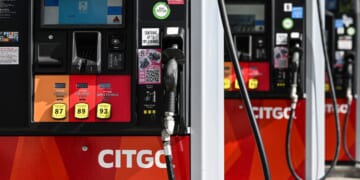 Gas pumps are seen at a CITGO gas station in Houston, Texas, on Dec. 2, 2025.