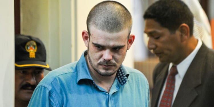Dutch national Joran Van der Sloot arrives at a hearing in Lurigancho prison in Lima on Jan. 11, 2011.