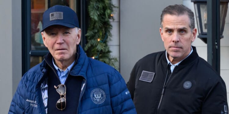 Former President Joe Biden and son Hunter Biden step out of a bookstore while shopping in Nantucket, Massachusetts, on Nov. 29, 2024.