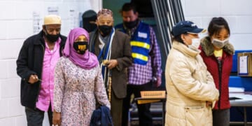 Somali-American voters cast their ballots at Brian Coyle Community Center in Minneapolis, Minnesota, on Nov. 3, 2020.