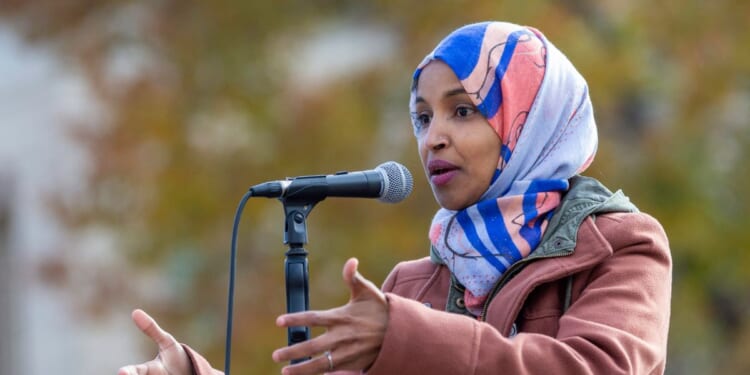 Rep. Ilhan Omar speaks to a group of supporters at University of Minnesota in Minneapolis, Minnesota, on Nov. 2, 2018.