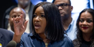Rep. Jasmine Crockett (D-TX) speaks to reporters at a news conference in Warrenville, Illinois, on Aug. 4, 2025.
